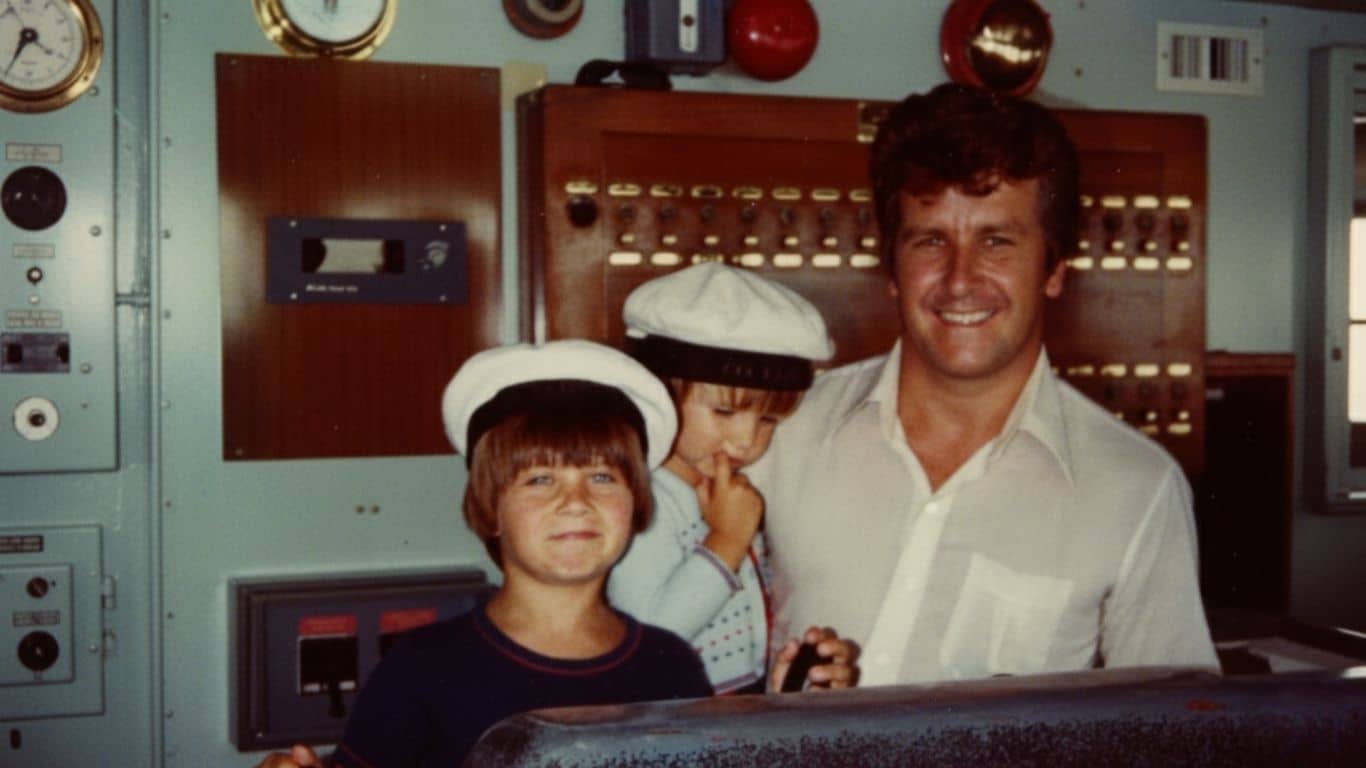 Jason Kearney and his brother With John Kearney on a boat